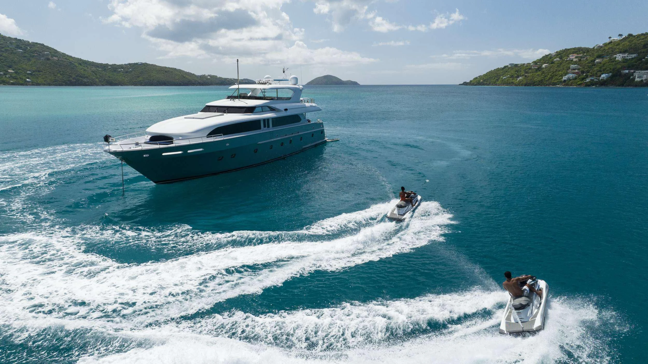 a boat and a boat on the water aboard OUTTA TOUCH Yacht for Sale