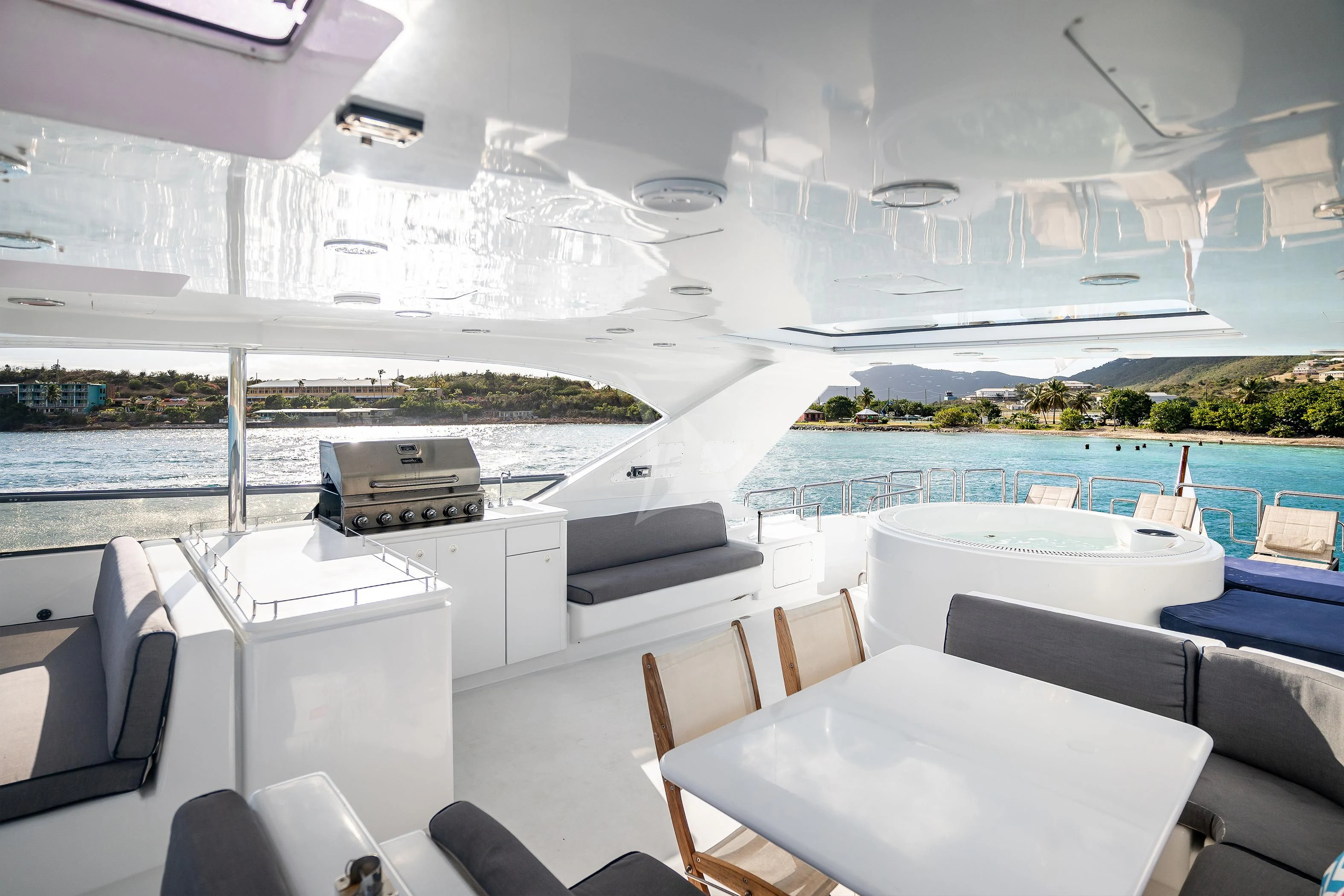 a room with tables and chairs aboard OUTTA TOUCH Yacht for Sale