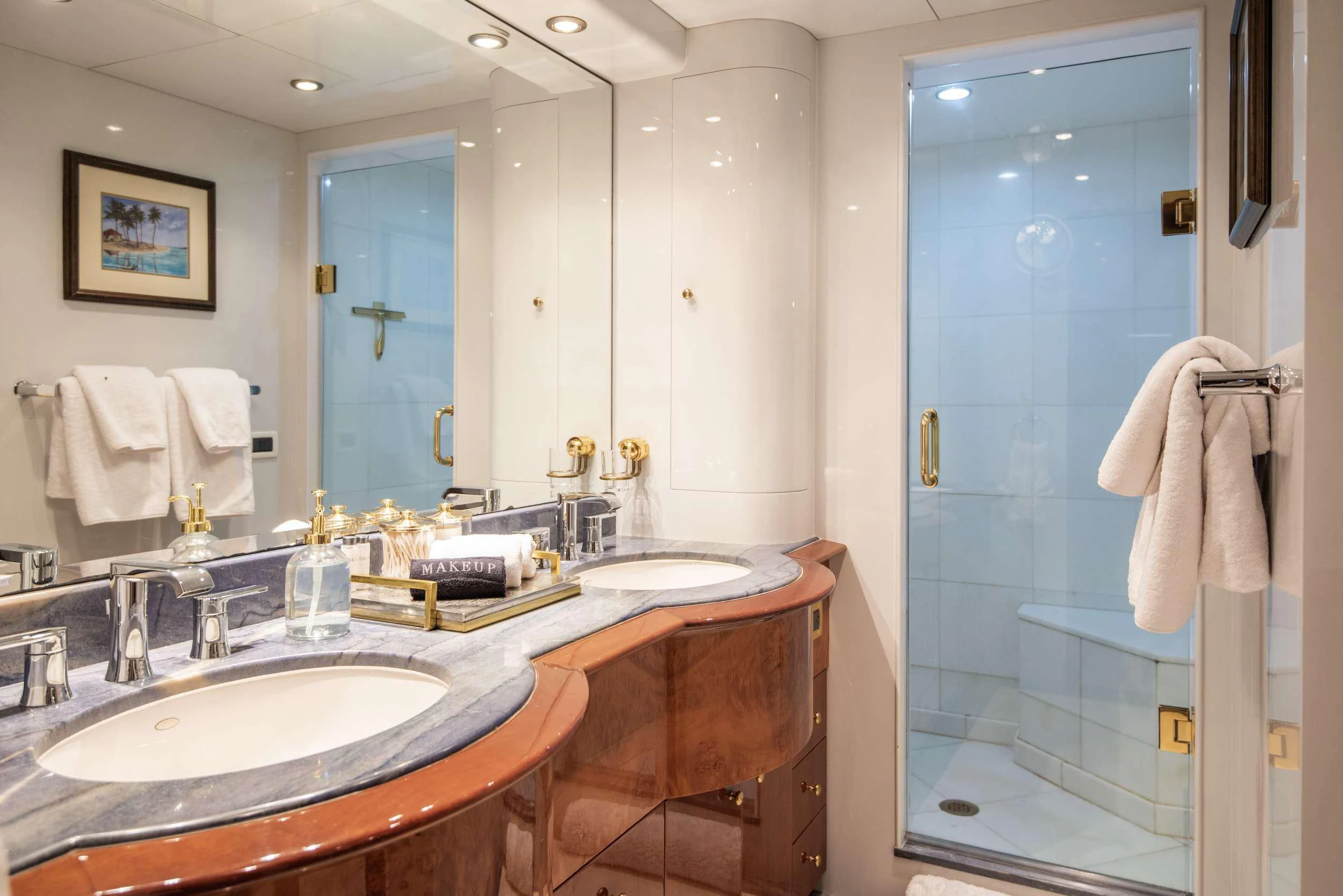 a bathroom with a sink and a mirror aboard OUTTA TOUCH Yacht for Sale