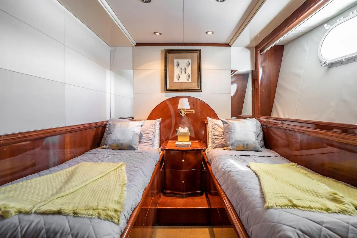 a couple of beds in a room aboard OUTTA TOUCH Yacht for Sale