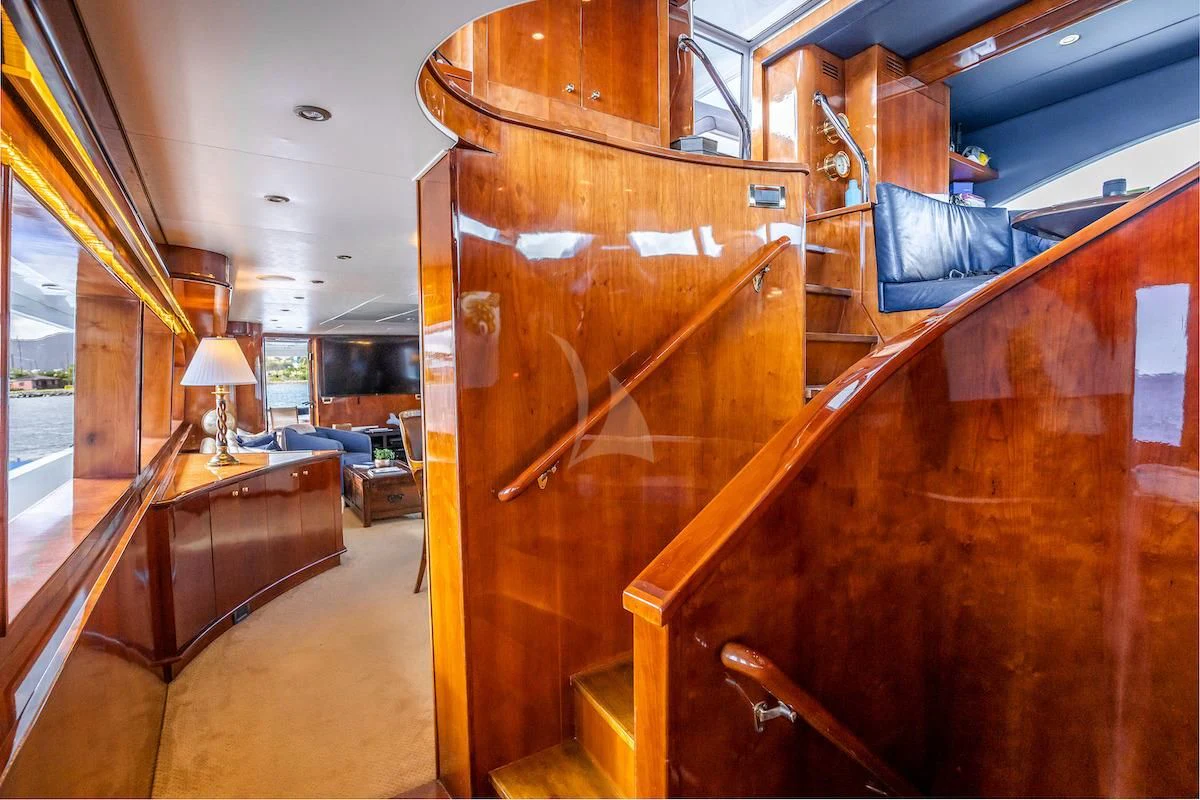 a room with wooden furniture aboard OUTTA TOUCH Yacht for Sale
