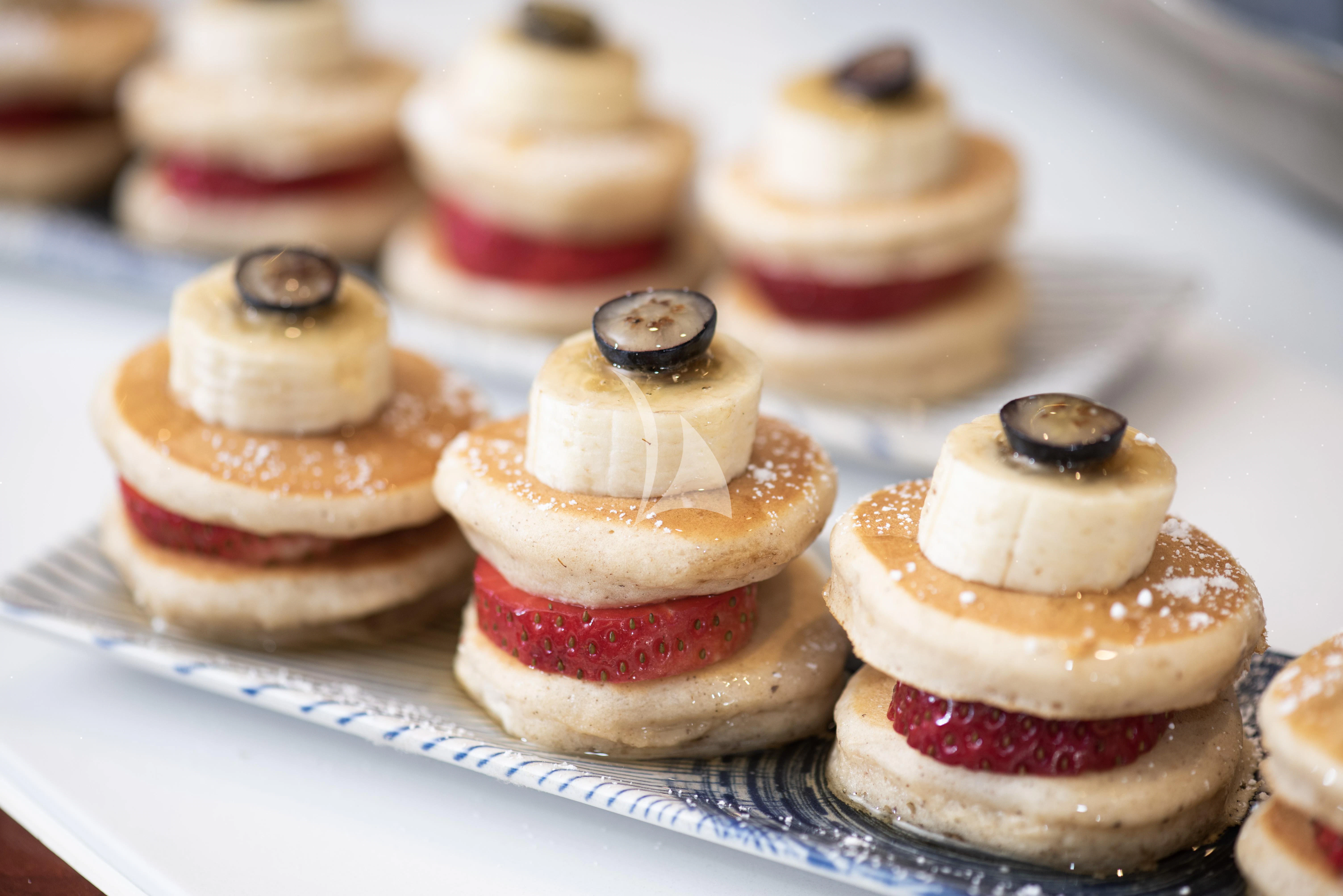 a tray of desserts aboard OUTTA TOUCH Yacht for Sale