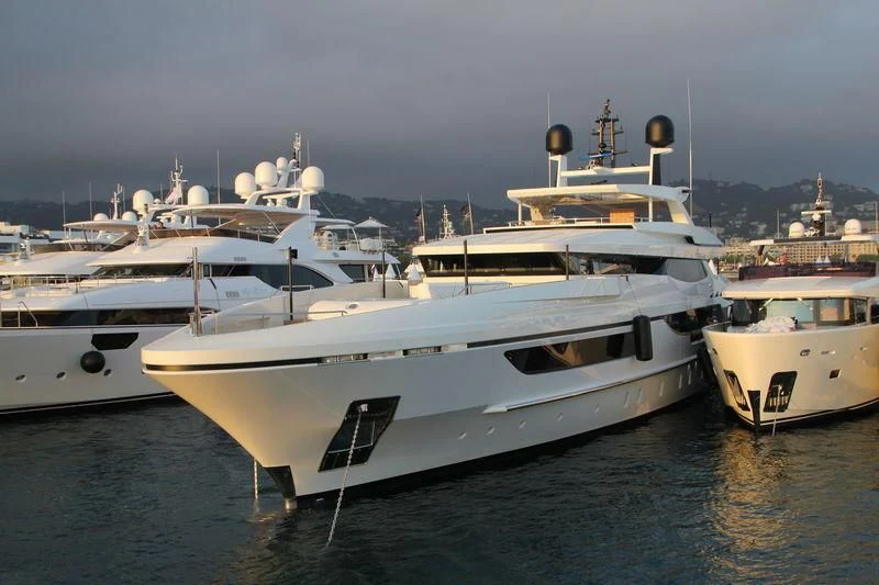several boats in a harbor aboard MR. T Yacht for Charter