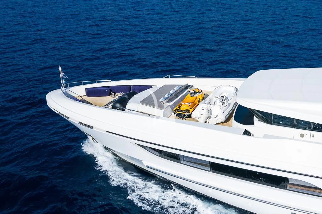 a boat with a motor on the water aboard MR. T Yacht for Charter