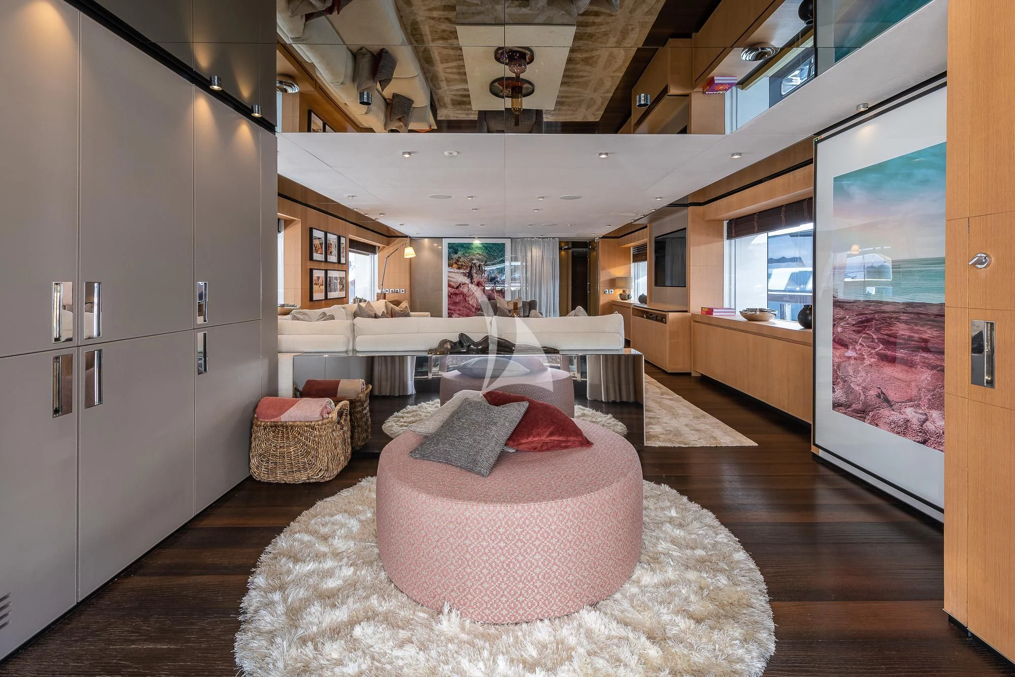 a room with a bed and a chair aboard MR. T Yacht for Charter