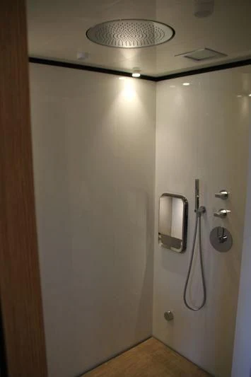 a light fixture on a wall aboard MR. T Yacht for Charter