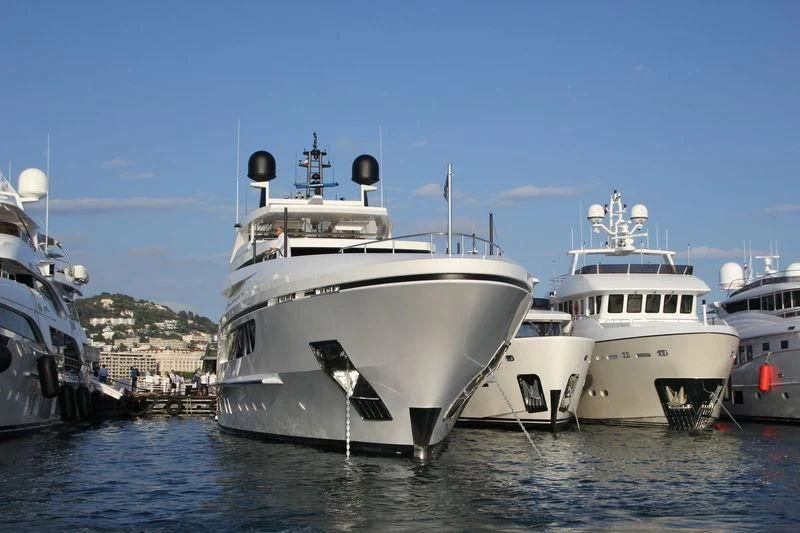 a group of boats in a harbor aboard MR. T Yacht for Charter