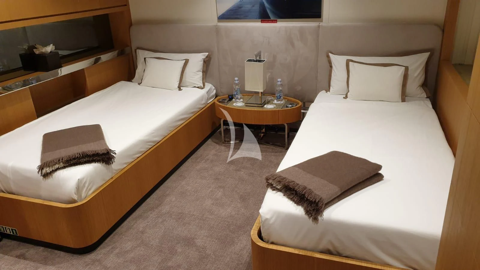 a room with two beds aboard MR. T Yacht for Charter