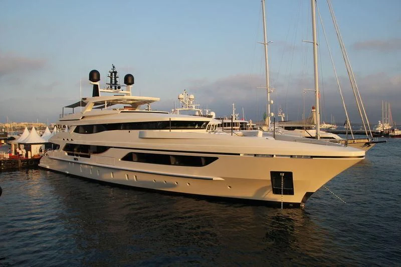 a large white boat in the water aboard MR. T Yacht for Charter