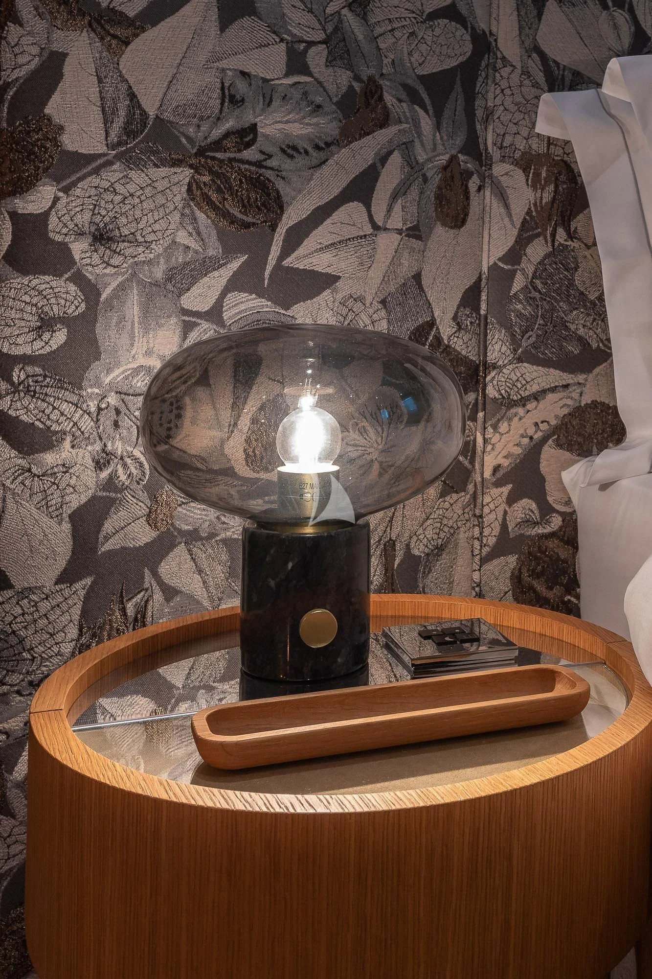 a candle on a table aboard MR. T Yacht for Charter