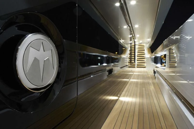 a large tunnel with a large clock aboard MR. T Yacht for Charter