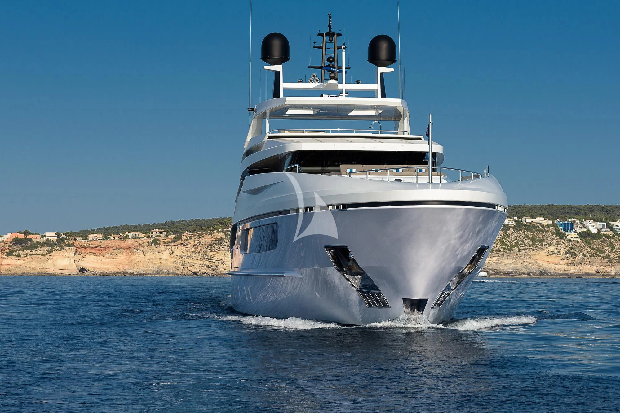 a large white ship on the water aboard MR. T Yacht for Charter