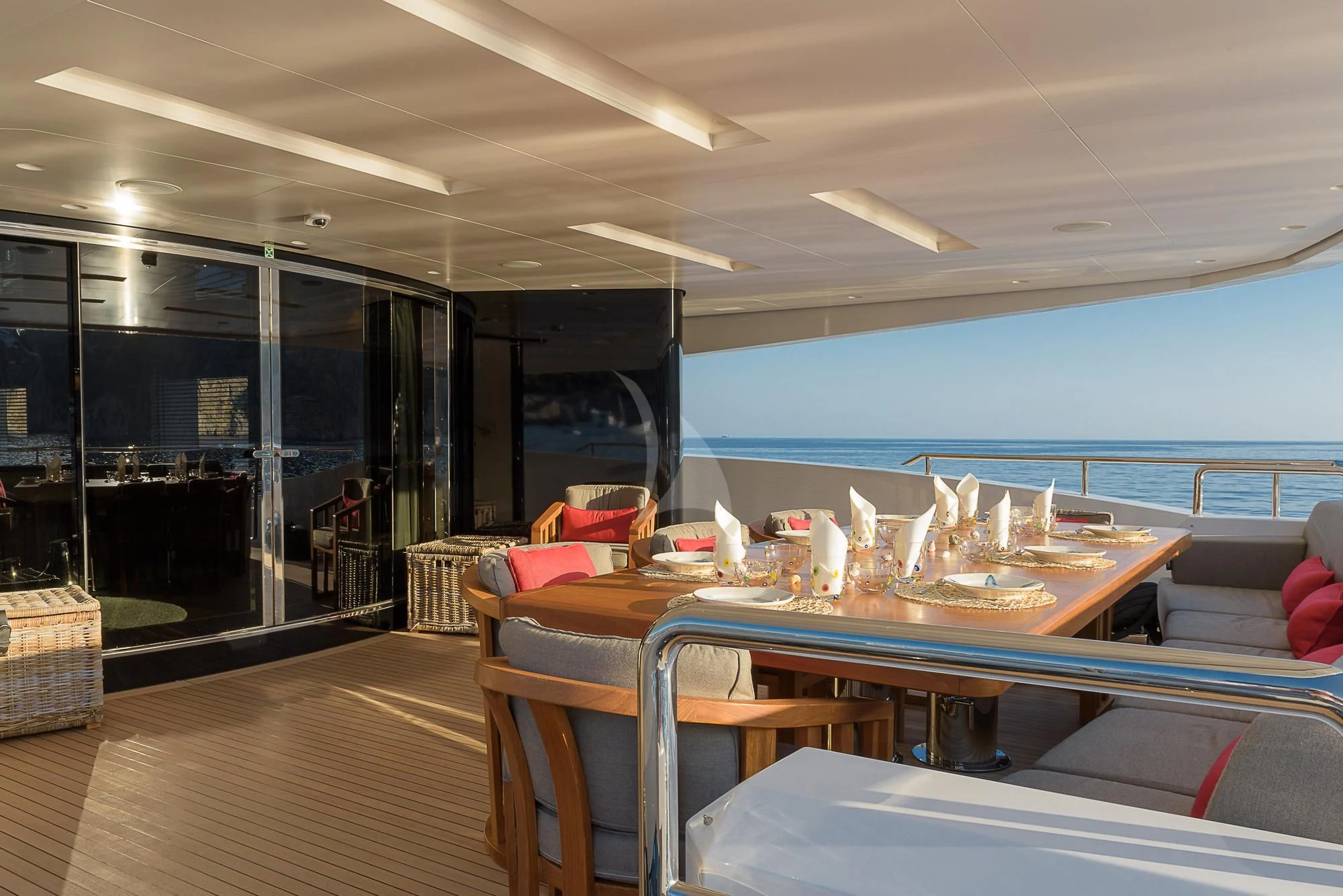 a room with a table and chairs aboard MR. T Yacht for Charter