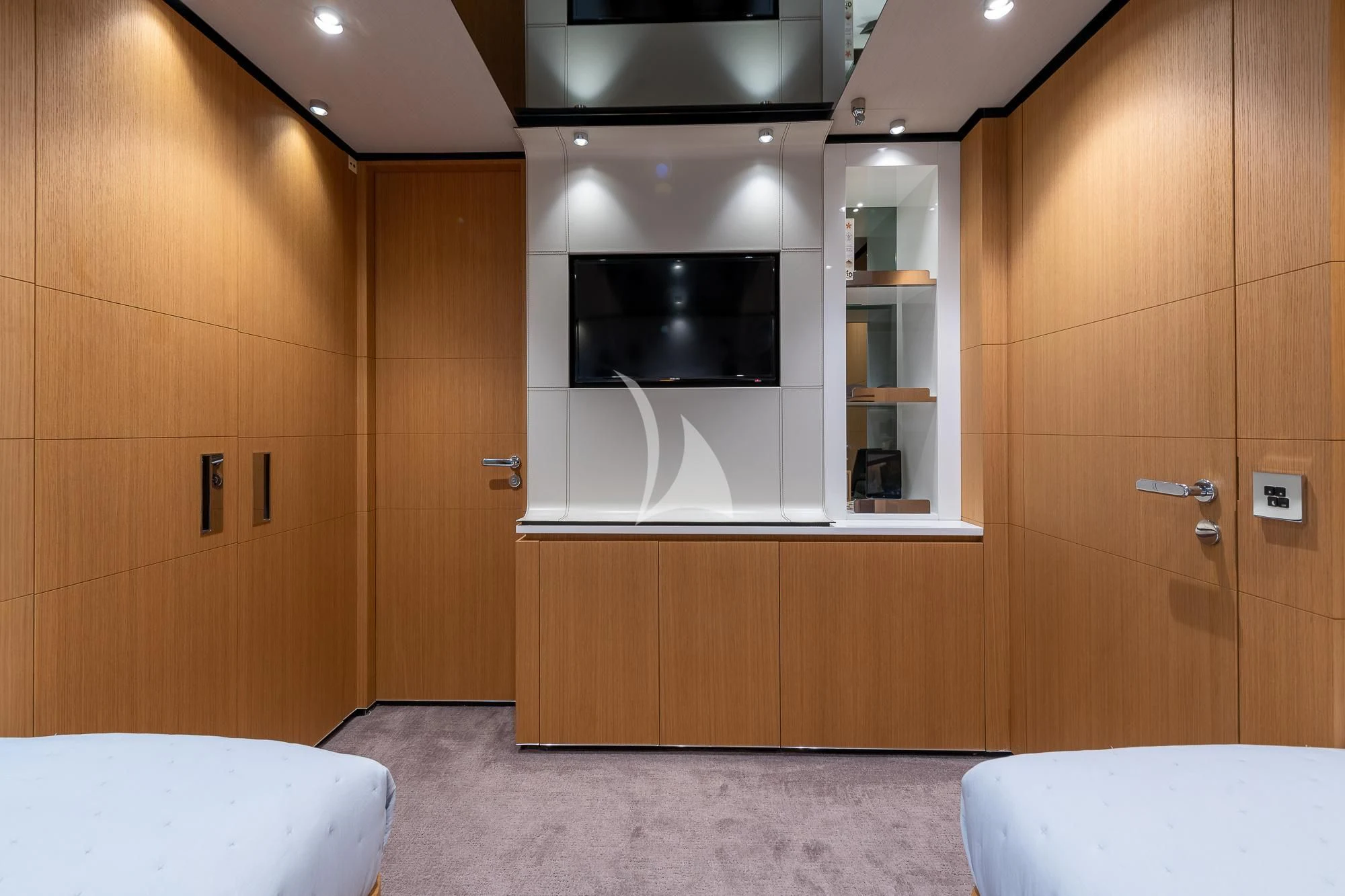 a room with a mirror and a bed aboard MR. T Yacht for Charter