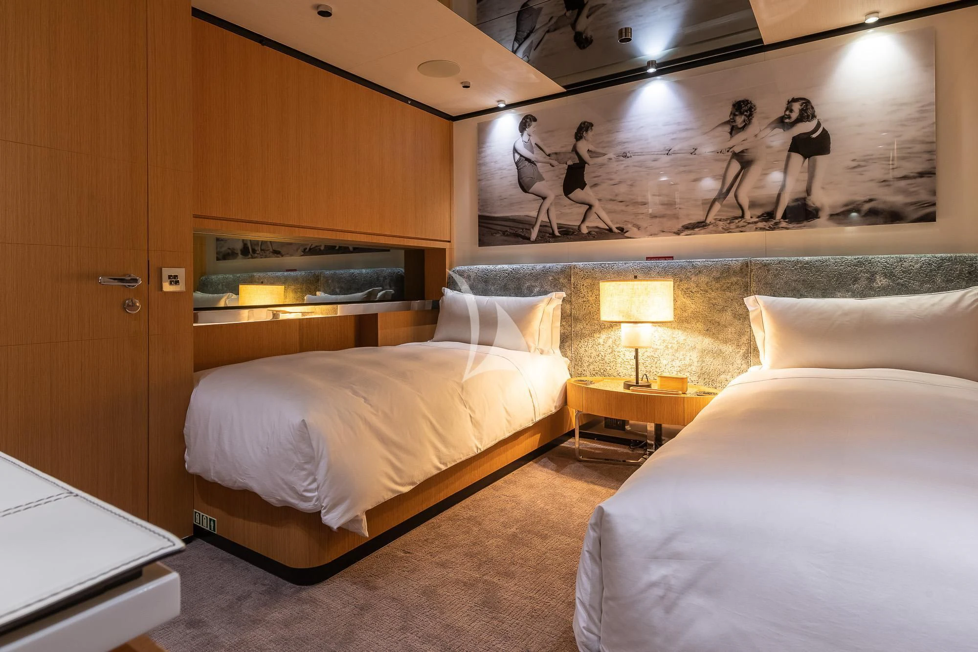 a room with two beds aboard MR. T Yacht for Charter