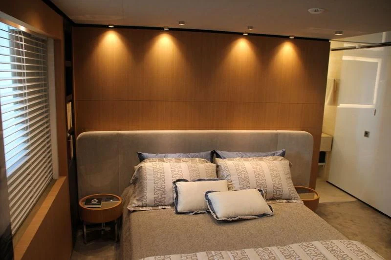 a couch with pillows aboard MR. T Yacht for Charter