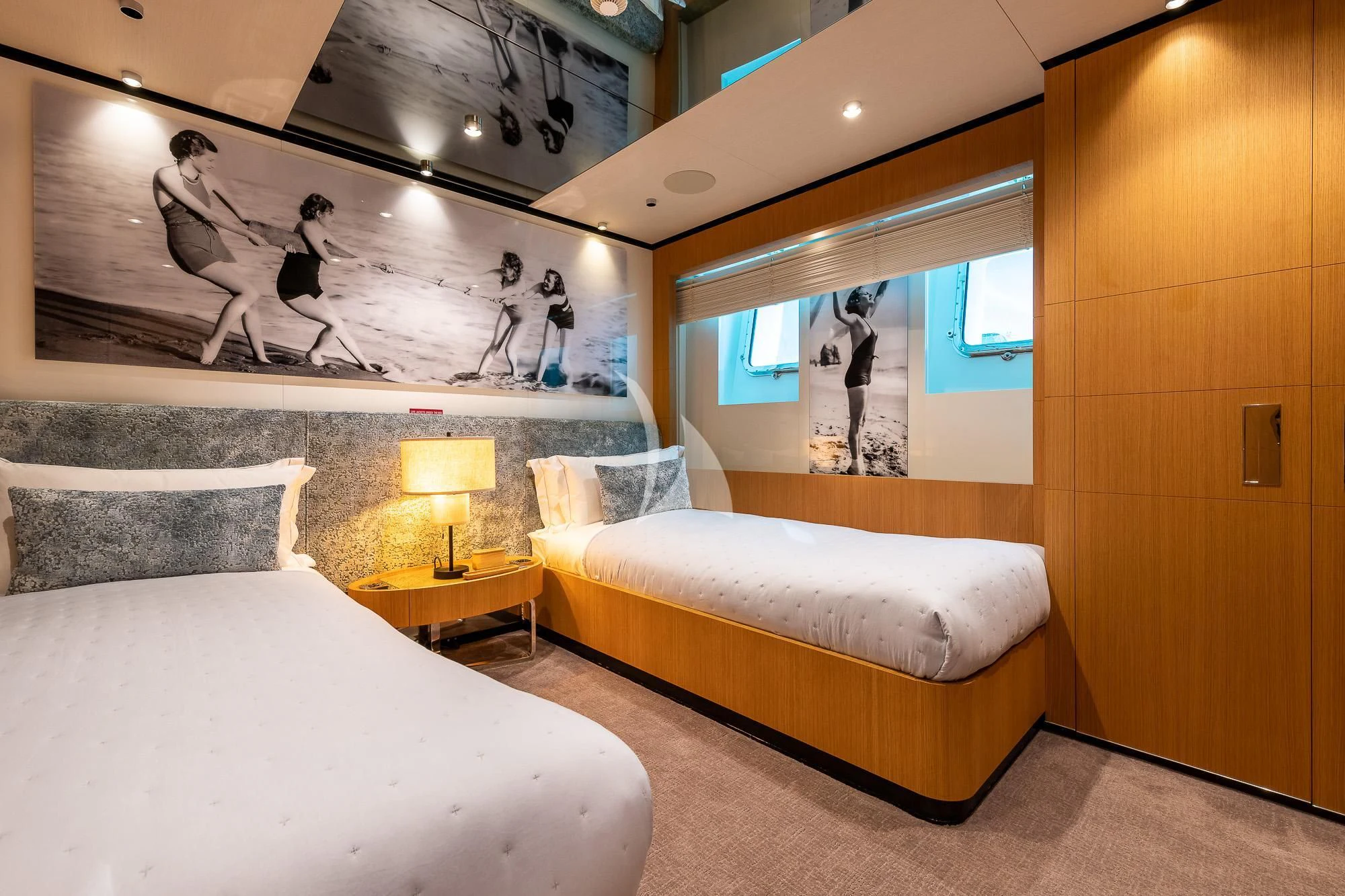 a room with two beds aboard MR. T Yacht for Charter