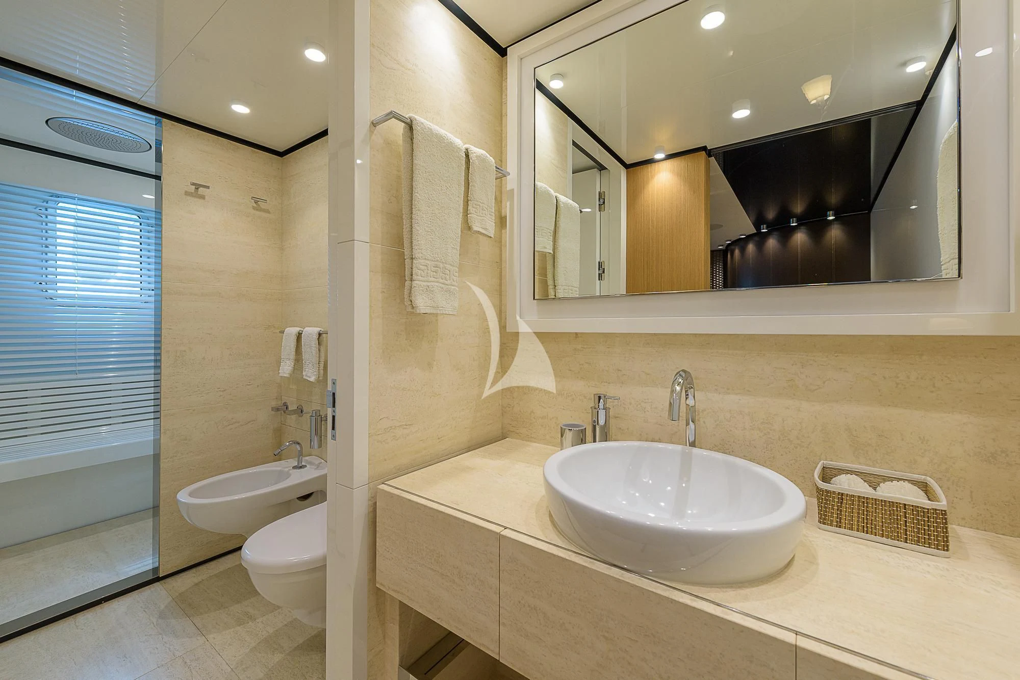 a bathroom with a large mirror aboard MR. T Yacht for Charter