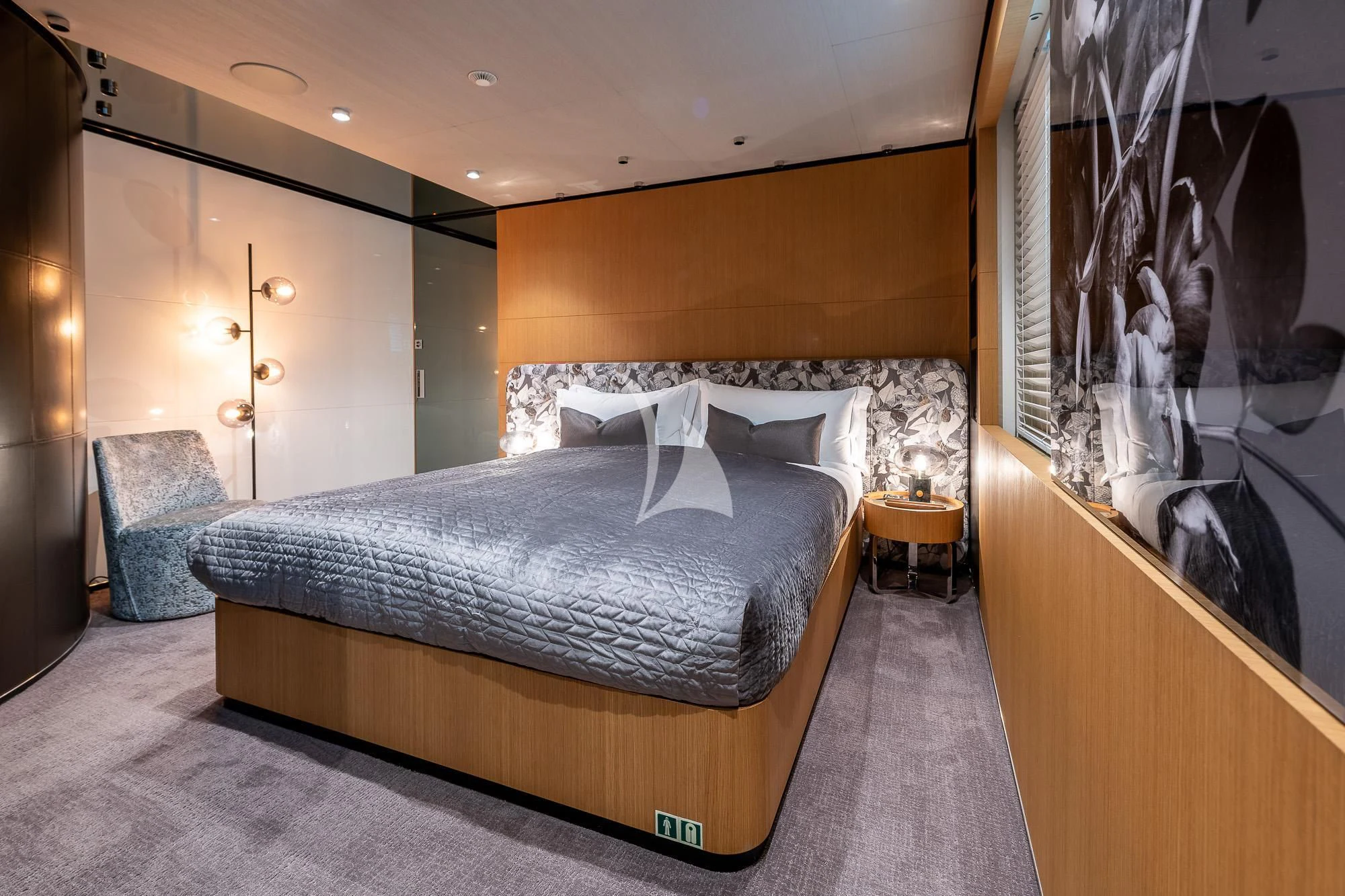 a bed in a room aboard MR. T Yacht for Charter