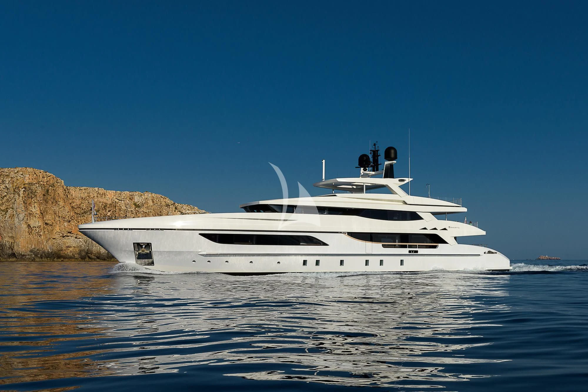 a white yacht on the water aboard MR. T Yacht for Charter
