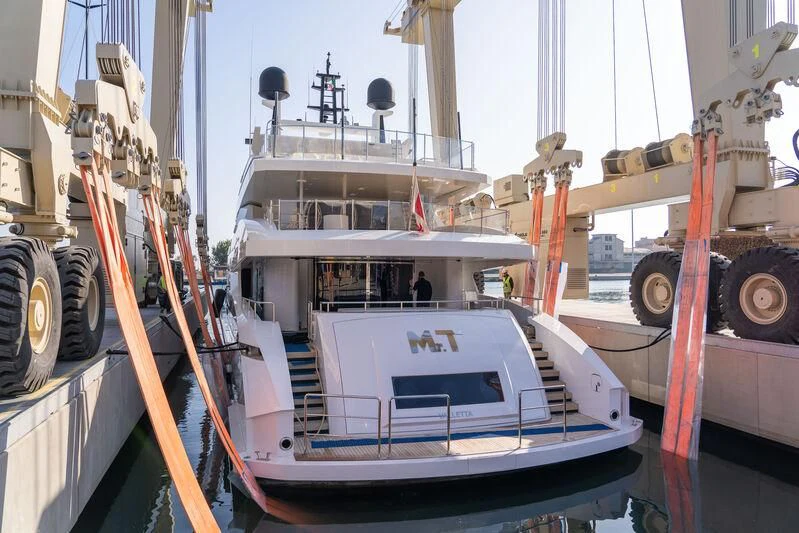 a boat in a harbor aboard MR. T Yacht for Charter