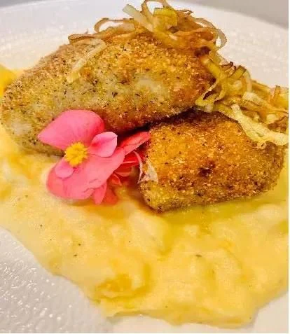 a plate of food aboard MR. T Yacht for Charter