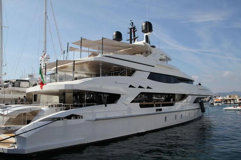 a white yacht in the water aboard MR. T Yacht for Charter