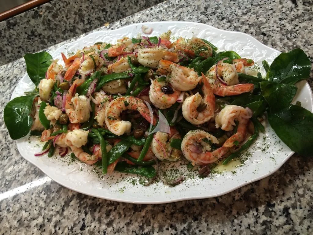 a plate of food aboard MR. T Yacht for Charter