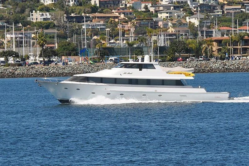 a white yacht in the water aboard HI BALL Yacht for Sale
