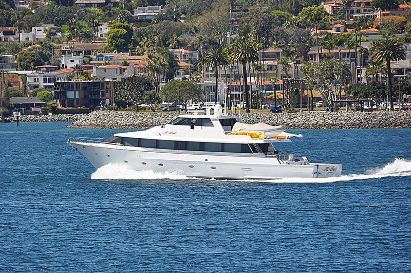 a white yacht on the water aboard HI BALL Yacht for Sale