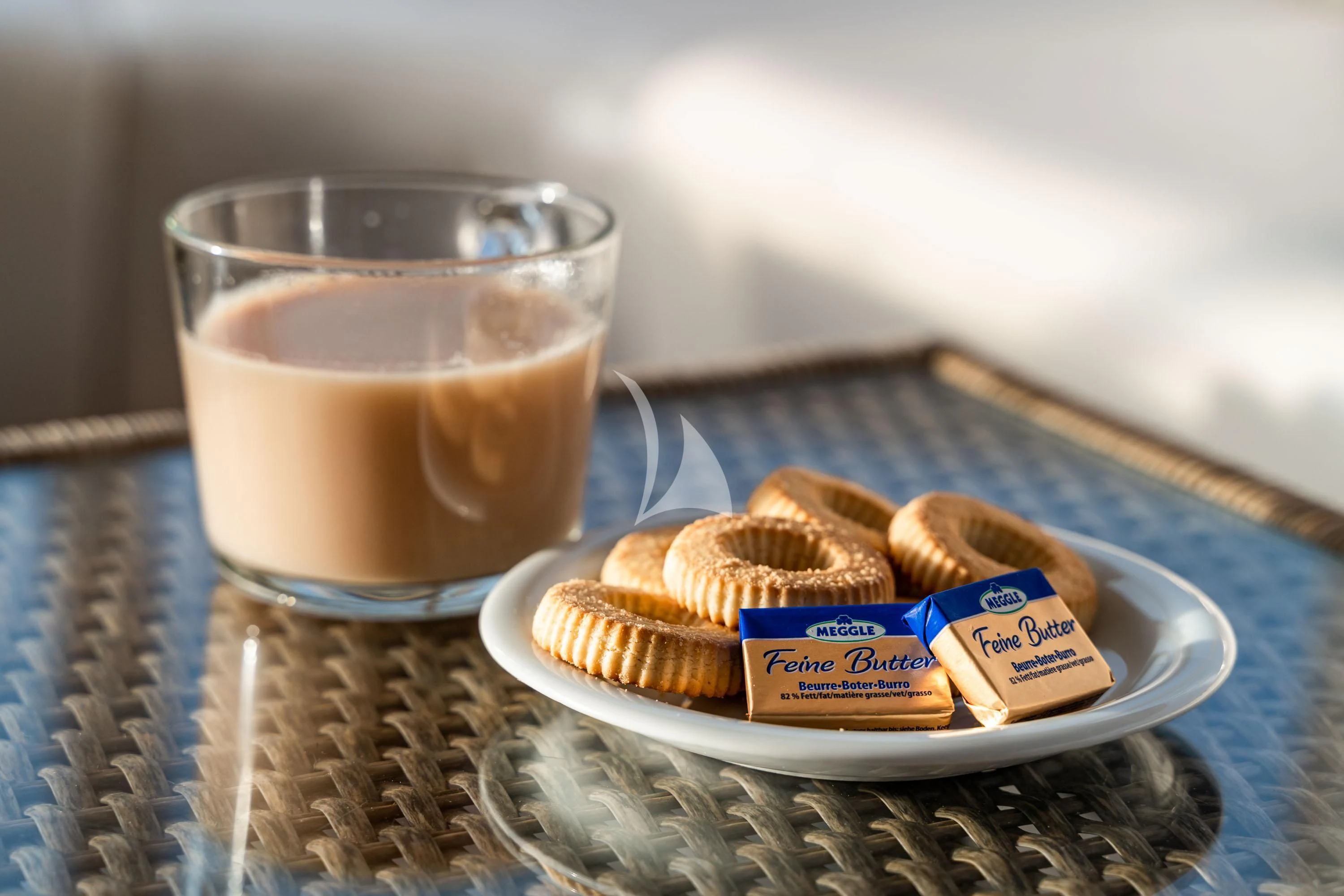 a plate of food and a glass of beer aboard QUEEN ELEGANZA Yacht for Sale