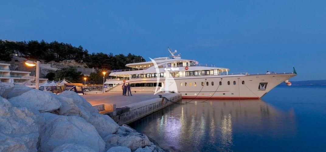 a large cruise ship docked aboard QUEEN ELEGANZA Yacht for Sale