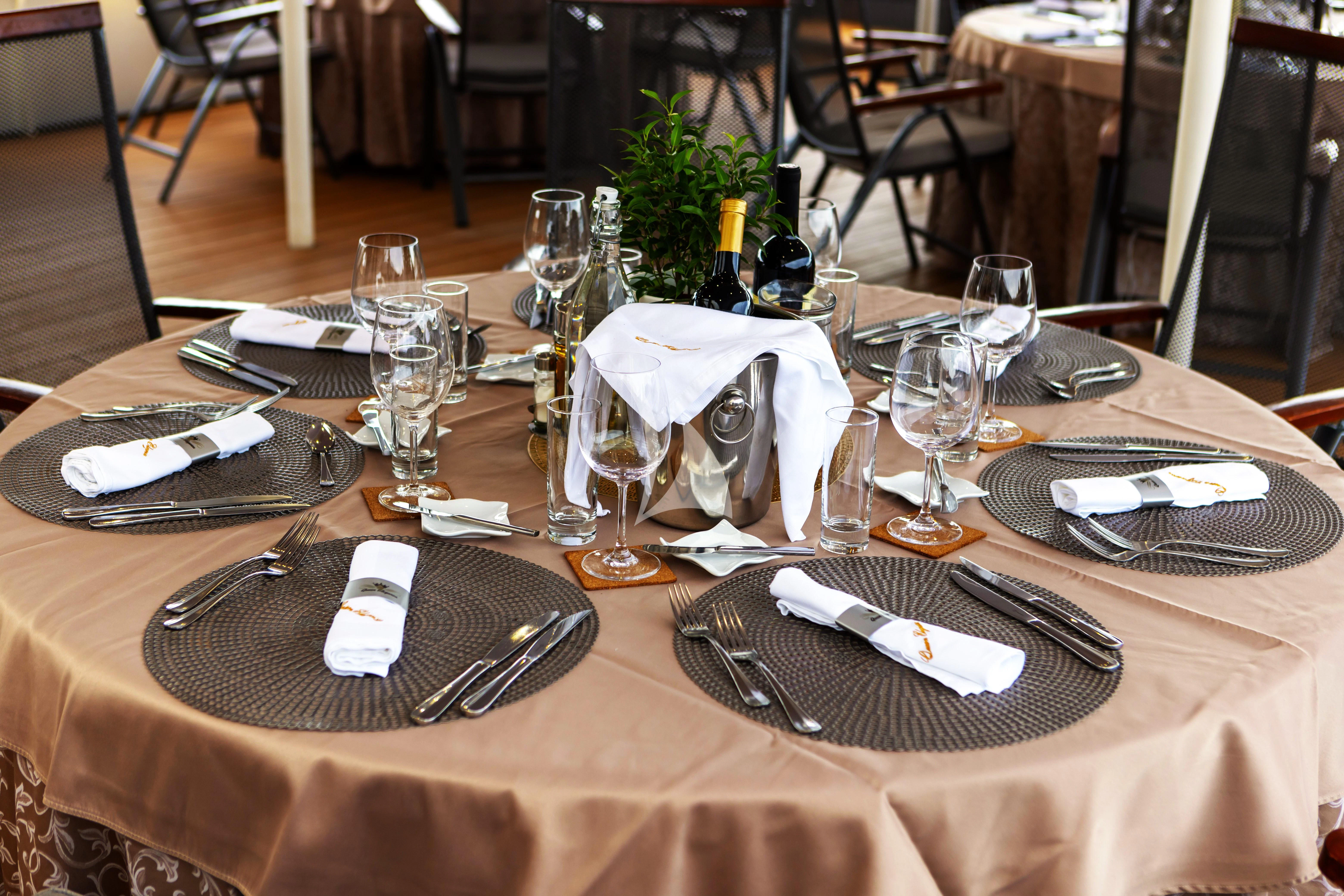 a table with place settings aboard QUEEN ELEGANZA Yacht for Sale