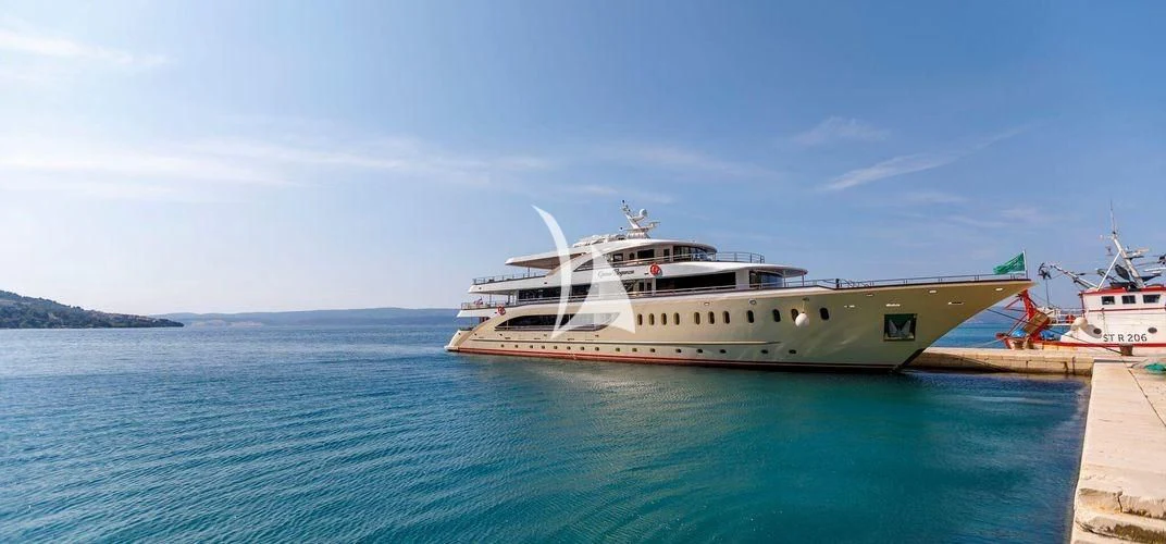 a couple of boats on a body of water aboard QUEEN ELEGANZA Yacht for Sale