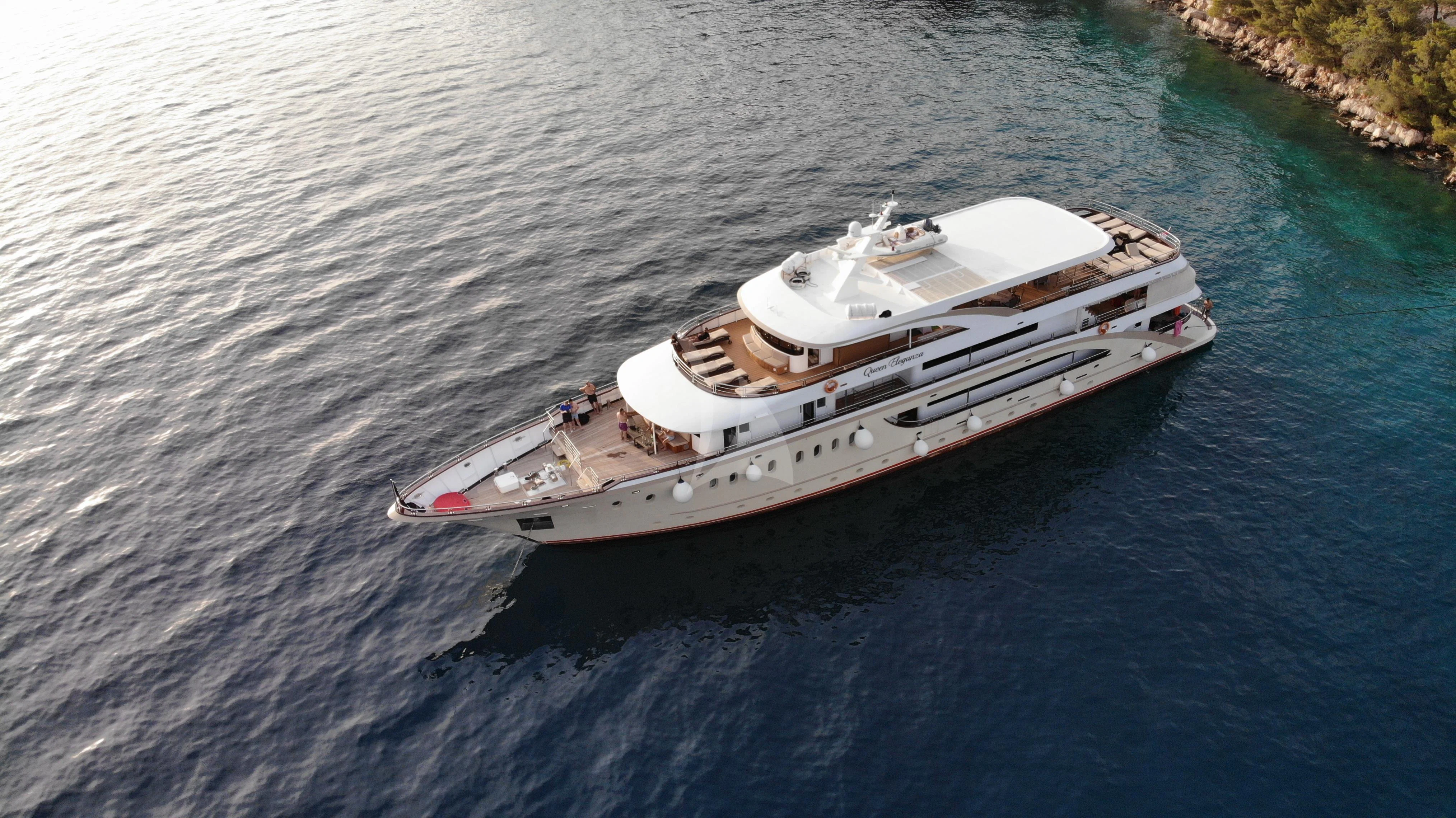 a boat on the water aboard QUEEN ELEGANZA Yacht for Sale