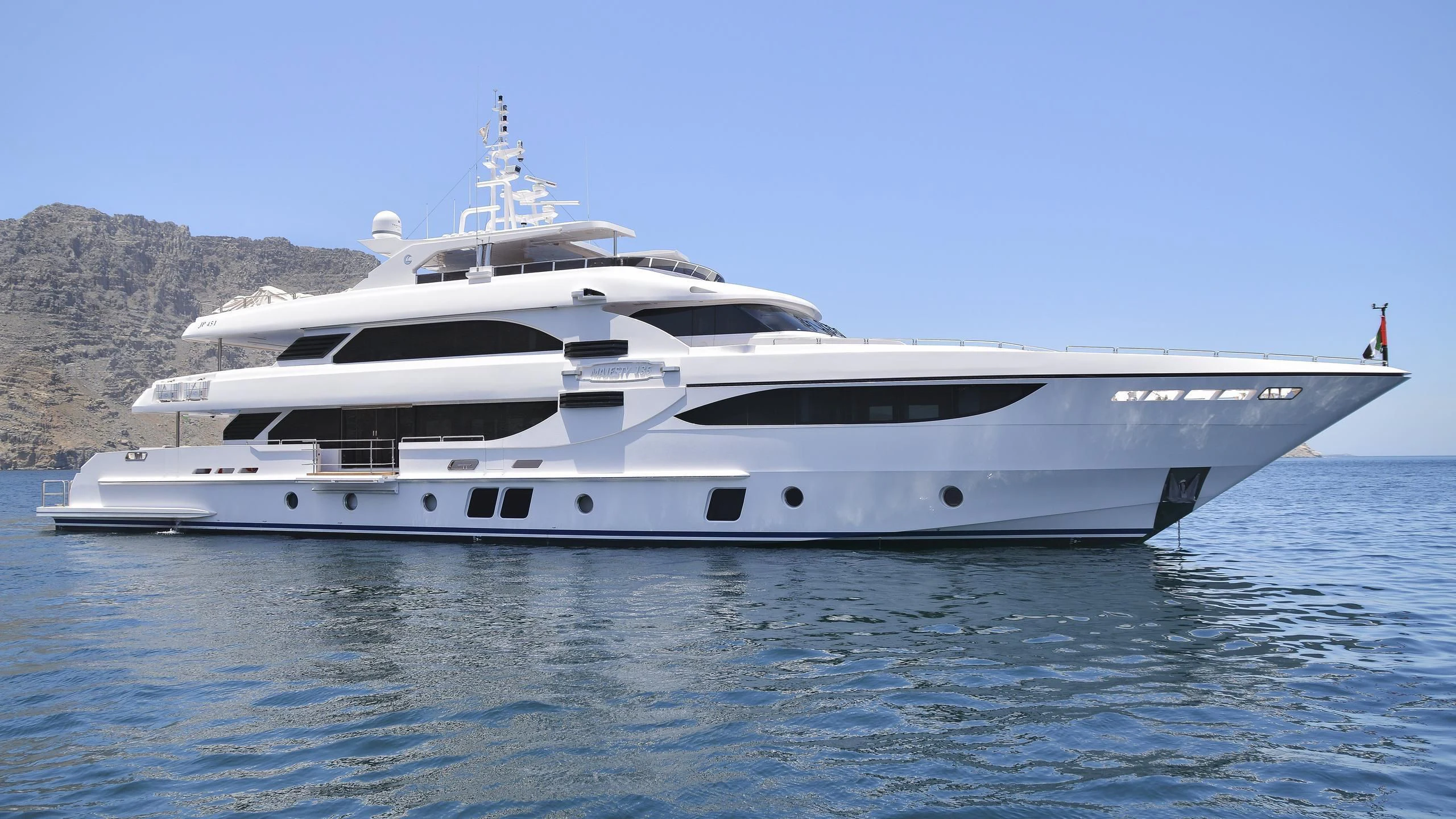 a large white yacht in the water aboard DUBAI STAR 1 Yacht for Sale