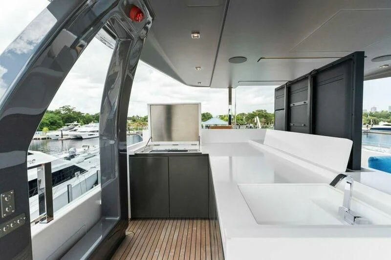 a modern kitchen with glass doors aboard OFFICIAL PLAN Yacht for Sale