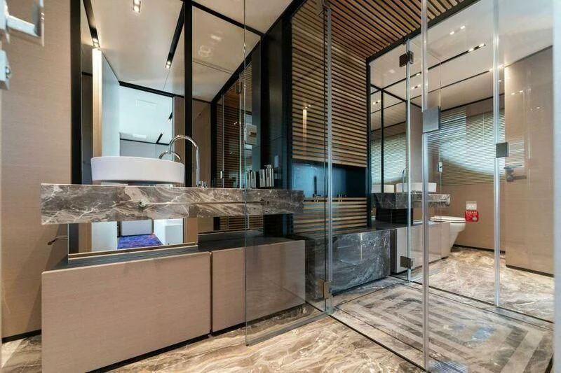 a large room with a glass wall aboard OFFICIAL PLAN Yacht for Sale