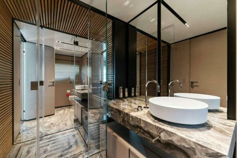 a bathroom with a sink and a shower aboard OFFICIAL PLAN Yacht for Sale