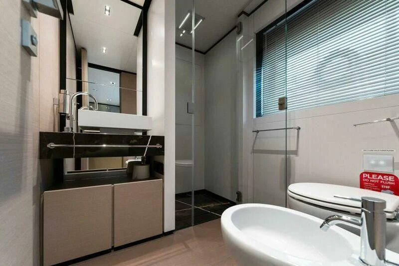 a bathroom with a sink and a shower aboard OFFICIAL PLAN Yacht for Sale