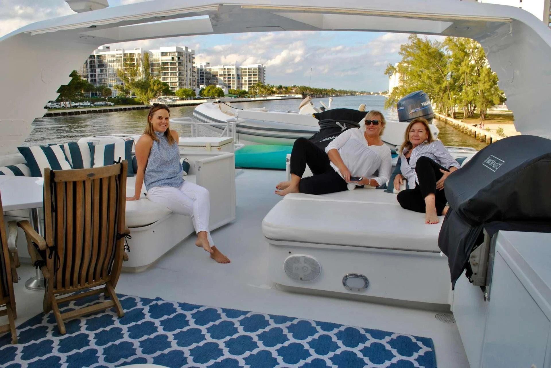 a group of people sitting on a boat aboard LADY LEX Yacht for Sale