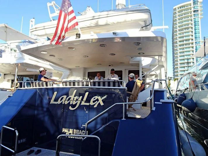 a group of people on a boat aboard LADY LEX Yacht for Sale