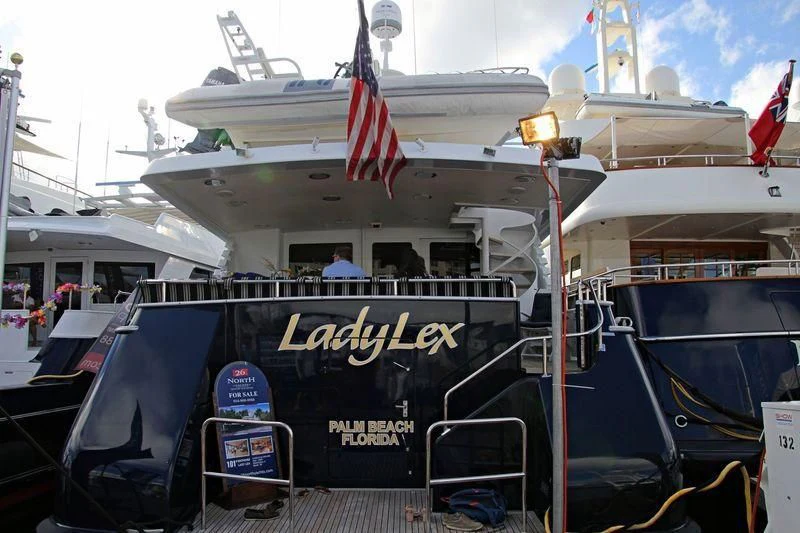 a boat with flags on the deck aboard LADY LEX Yacht for Sale