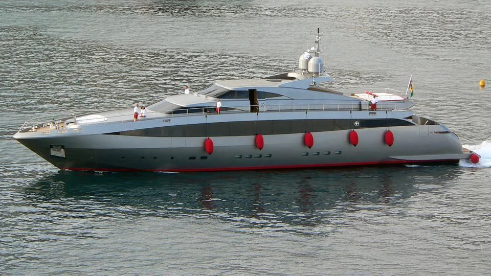 a large boat in the water aboard NINA J Yacht for Sale