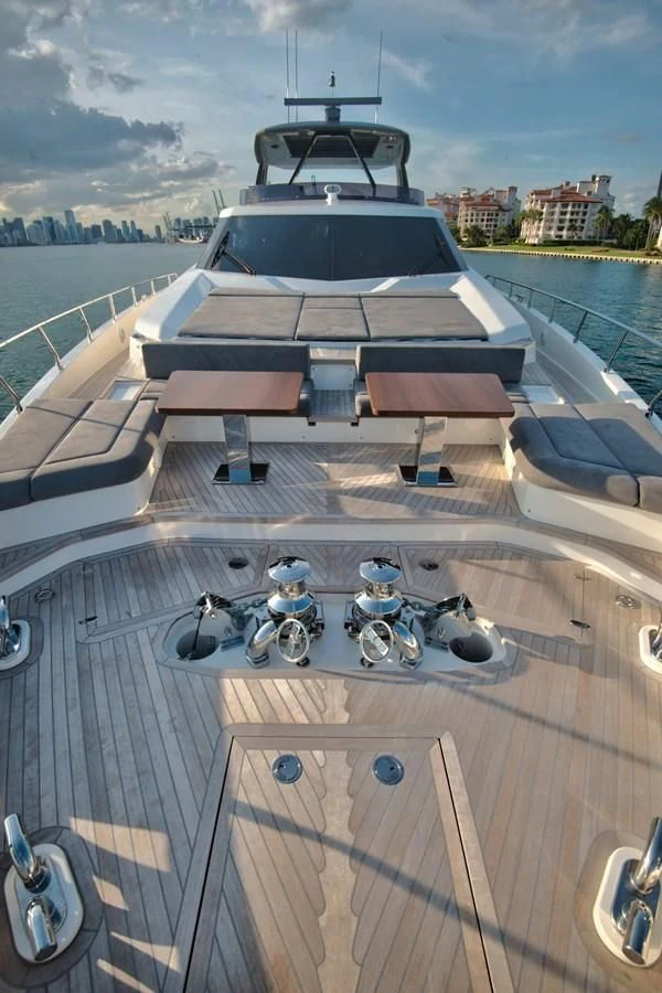 a boat with a motorbike on it aboard CIAO II Yacht for Sale