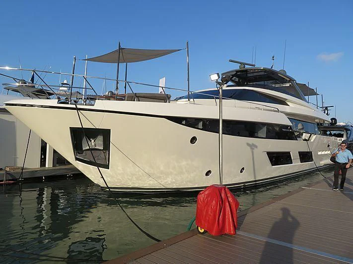a boat docked at a pier aboard CIAO II Yacht for Sale