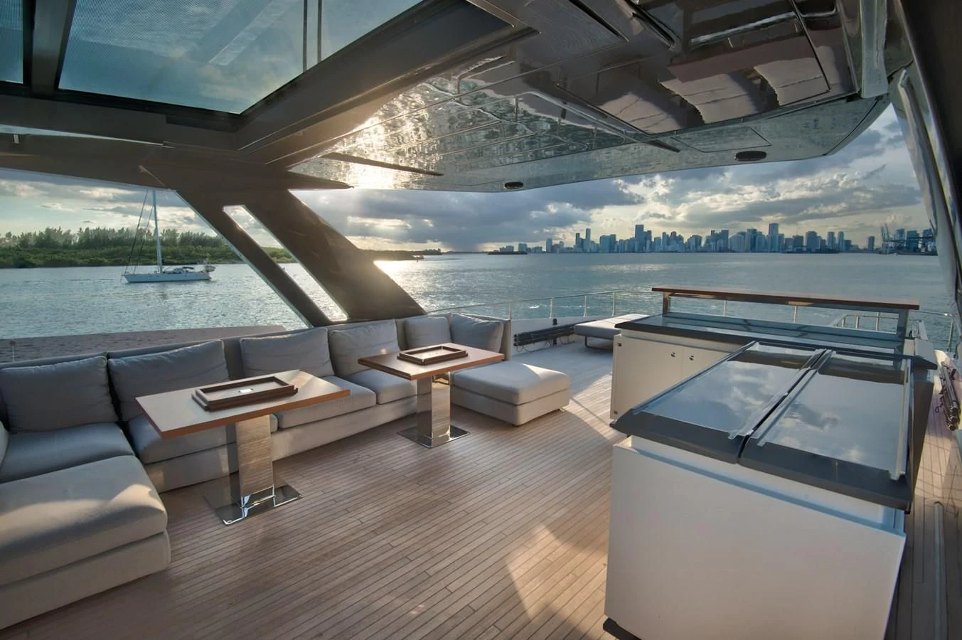 a living room with a large pool aboard CIAO II Yacht for Sale