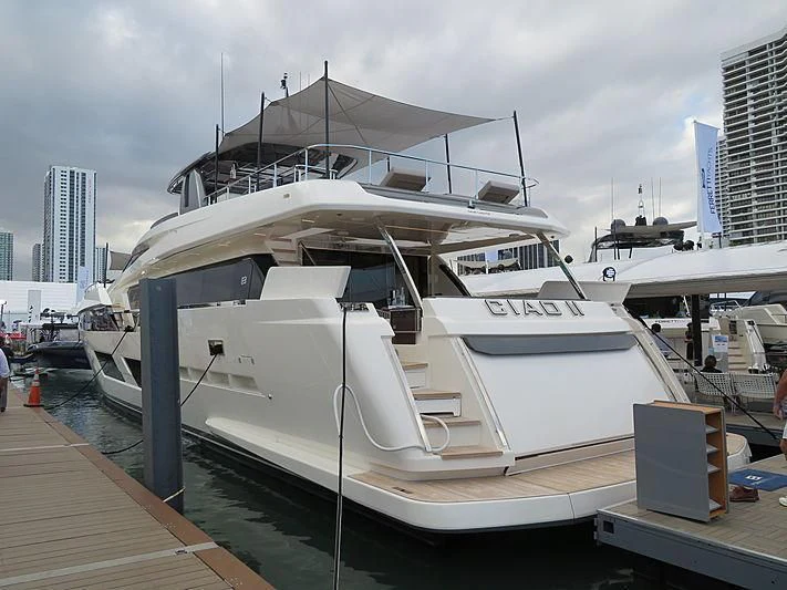a white yacht docked aboard CIAO II Yacht for Sale