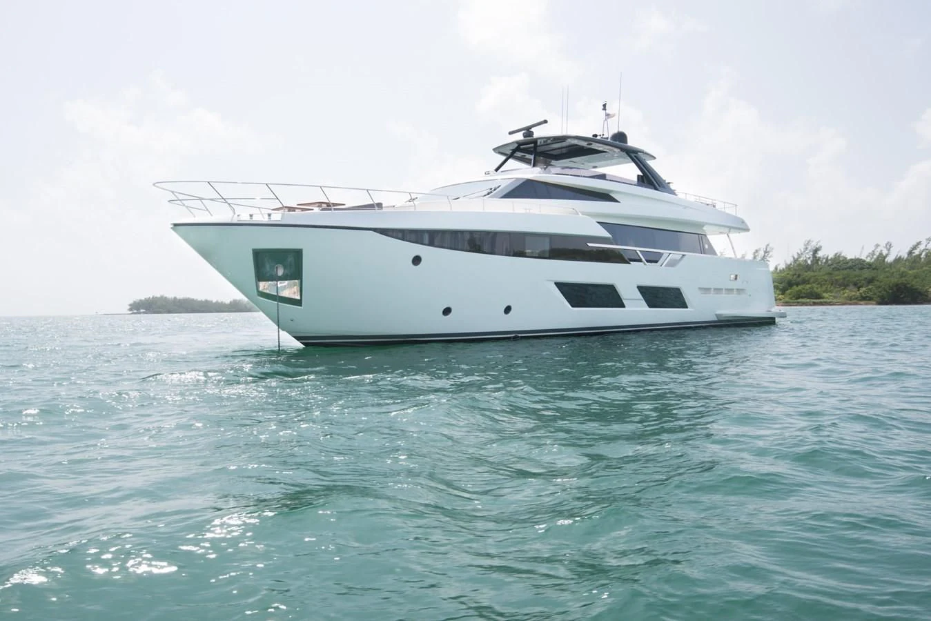 a white yacht in the water aboard CIAO II Yacht for Sale