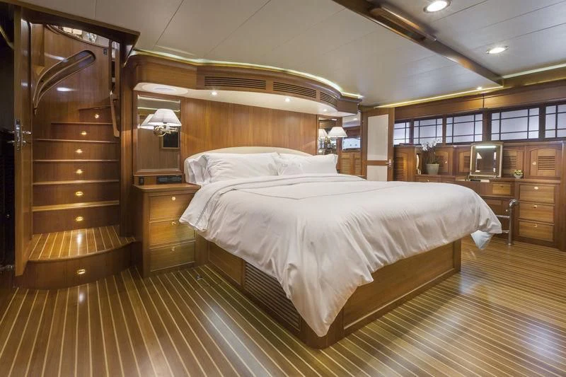 a large bed in a room aboard VIRGINIA SEA Yacht for Sale